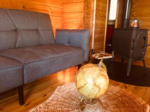 Posezení v ubytování Chalet Le Cactus avec sauna privatif