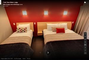 Voodi või voodid majutusasutuse Park View Motor Lodge toas