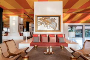 a dining room with a table and chairs at Cinnamon Bentota Beach - Signature Selection in Bentota