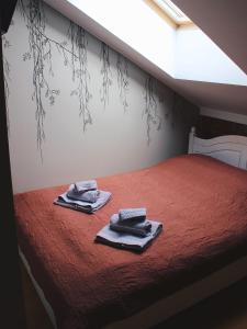 Postel nebo postele na pokoji v ubytování Guesthouse Mõisa Ait