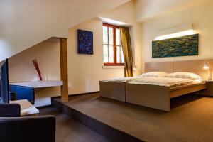Postel nebo postele na pokoji v ubytování Waldhotel am Nürburgring