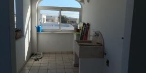 Kuchyň nebo kuchyňský kout v ubytování Le sorgenti camere e appartamenti