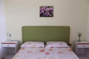 Postel nebo postele na pokoji v ubytování Le sorgenti camere e appartamenti