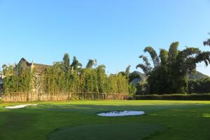 a view of the green at a golf course at Banyan Tree Yangshuo in Yangshuo