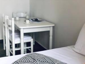 Cama ou camas em um quarto em En Plo