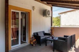 Posezení v ubytování Apartmani Lana