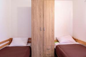 Postel nebo postele na pokoji v ubytování Apartmani Lana