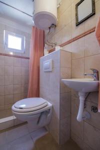 Koupelna v ubytování Apartmani Lana
