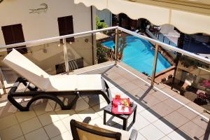 Bazén v ubytování Coccodrillo Hotel & Apartments nebo v jeho okolí