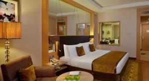 Krevet ili kreveti u jedinici u okviru objekta Radisson Resort & Spa Kandla