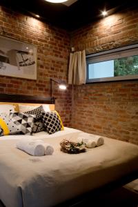 Postel nebo postele na pokoji v ubytování Apartamenty Folwark Boguszyn