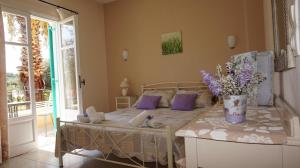 Postelja oz. postelje v sobi nastanitve Artemis Apartments ( Yiannis House)