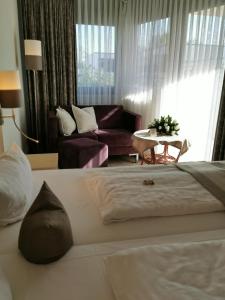 Postel nebo postele na pokoji v ubytování Hotel Cristal