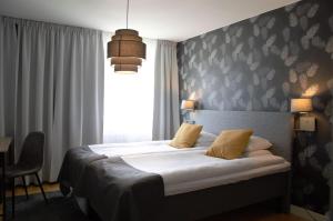 Voodi või voodid majutusasutuse Hotell Falköping, Sure Hotel Collection by Best Western toas
