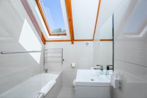 Vonios kambarys apgyvendinimo įstaigoje Roosenwijn Guesthouse