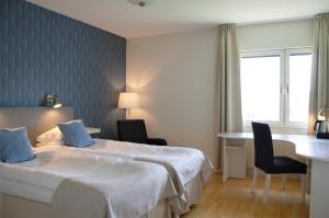 Voodi või voodid majutusasutuse Hotell Falköping, Sure Hotel Collection by Best Western toas