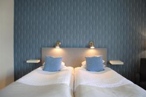 Voodi või voodid majutusasutuse Hotell Falköping, Sure Hotel Collection by Best Western toas