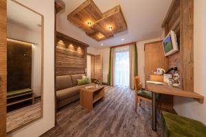 TV a/nebo společenská místnost v ubytování Hotel Sporthof Austria