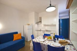Кухня или мини-кухня в Residence Golfo Della Lacona
