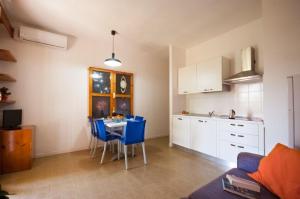 Кухня или мини-кухня в Residence Golfo Della Lacona

