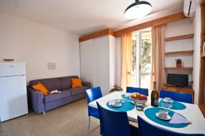 Гостиная зона в Residence Golfo Della Lacona