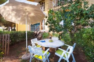 Сад в Residence Golfo Della Lacona