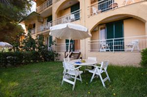 Сад в Residence Golfo Della Lacona