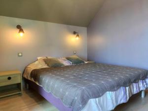 Coeur du Finistère tesisinde bir odada yatak veya yataklar