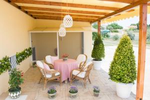 A garden outside Villa Elaia Mare