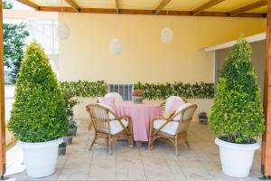 A garden outside Villa Elaia Mare