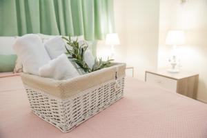 A bed or beds in a room at Villa Elaia Mare