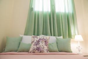 A bed or beds in a room at Villa Elaia Mare