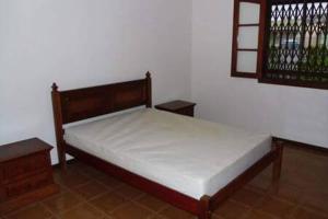 een bed in een kamer met bij Casa Temporada Arraial do Cabo in Arraial do Cabo