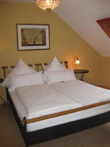 Cama o camas de una habitación en Ferienhaus Schausten