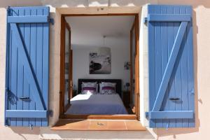 Katil atau katil-katil dalam bilik di La Flassantine - Appartement