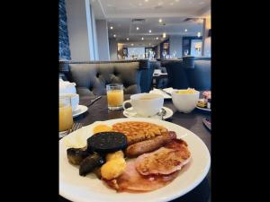 a plate of breakfast food on a table at Boulevard Hotel in Blackpool