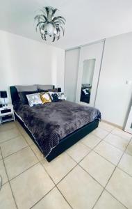 Postel nebo postele na pokoji v ubytování Maison d'hôtes chez Aud