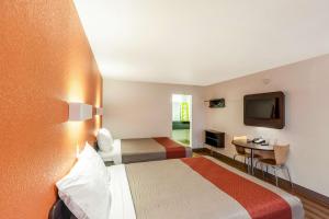 Säng eller sängar i ett rum på Motel 6 Fort Worth, Tx - Stockyards