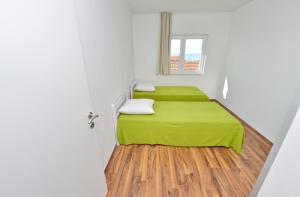 Posteľ alebo postele v izbe v ubytovaní Apartments Verita