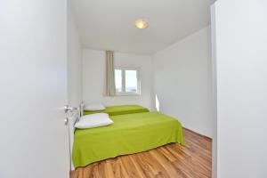Posteľ alebo postele v izbe v ubytovaní Apartments Verita