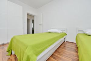 Posteľ alebo postele v izbe v ubytovaní Apartments Verita