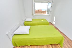 Posteľ alebo postele v izbe v ubytovaní Apartments Verita
