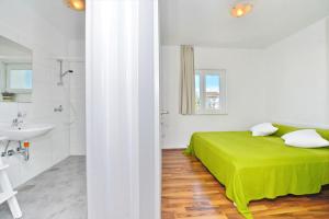 Posteľ alebo postele v izbe v ubytovaní Apartments Verita