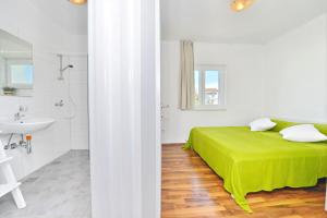Posteľ alebo postele v izbe v ubytovaní Apartments Verita