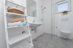 Kúpeľňa v ubytovaní Apartments Verita + 37 fotografií