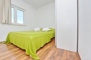 Posteľ alebo postele v izbe v ubytovaní Apartments Verita