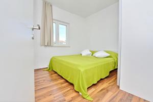 Posteľ alebo postele v izbe v ubytovaní Apartments Verita
