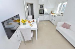 Kuchyňa alebo kuchynka v ubytovaní Apartments Verita