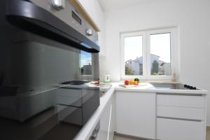 Kuchyňa alebo kuchynka v ubytovaní Apartments Verita