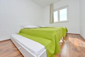 Posteľ alebo postele v izbe v ubytovaní Apartments Verita